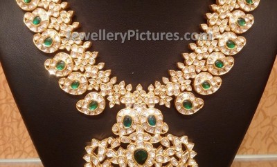 mango mala design with uncut diamonds and emeralds