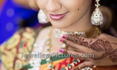 bride in champaswaralu gold designs