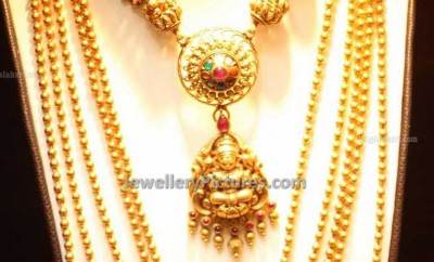 layerd chandrahar jewellery and gold beads necklace
