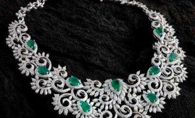 diamond necklace with emeralds and white gold