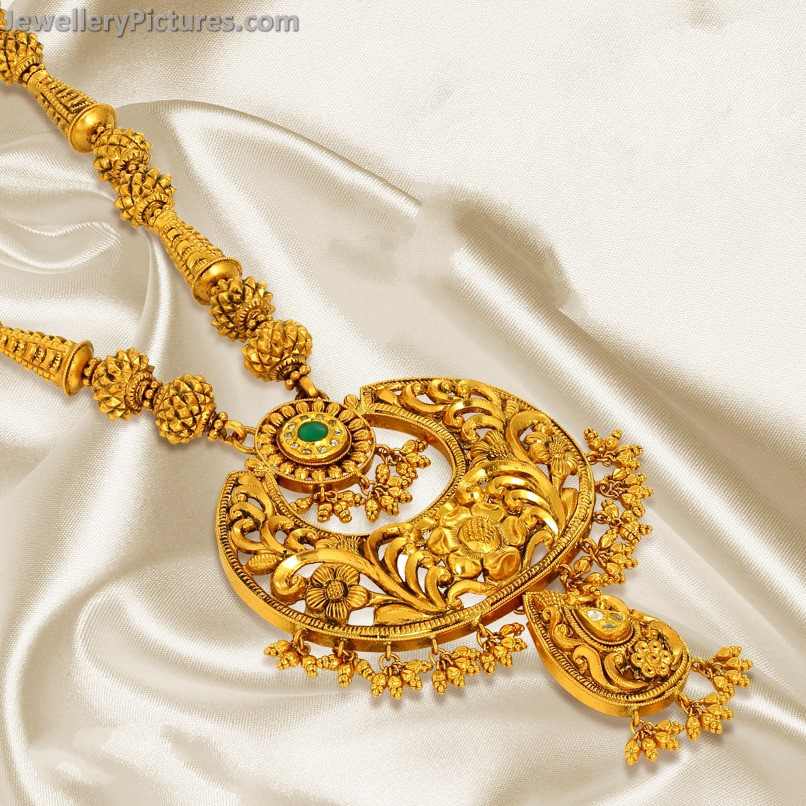 indian gold designs haram with pretty locket