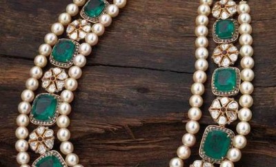 pearl diamond jewellery with emerald setting