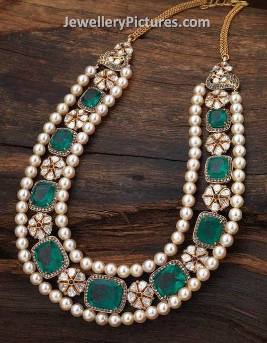 pearl diamond jewellery with emerald setting