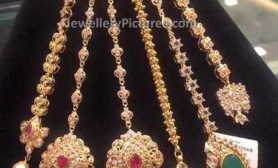 maang tikka gold designs studded with stones