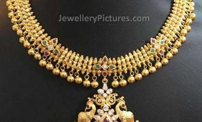gold designs catalogue necklace in peacock design