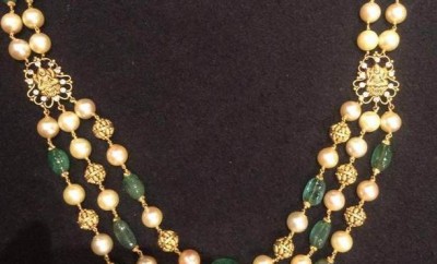 pearl chain designs traditional model in gold and emerald beads